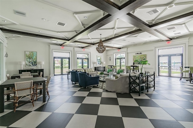 living room with visible vents, plenty of natural light, french doors, and coffered ceiling