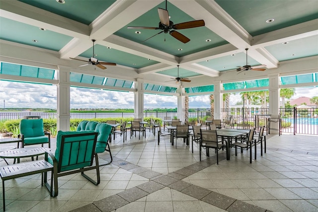 view of patio / terrace featuring a ceiling fan and fence