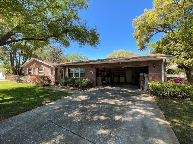 ranch-style home featuring brick siding, driveway, a front yard, and a garage