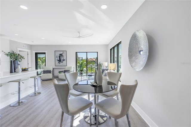 dining area featuring visible vents, baseboards, recessed lighting, light wood-style flooring, and a ceiling fan