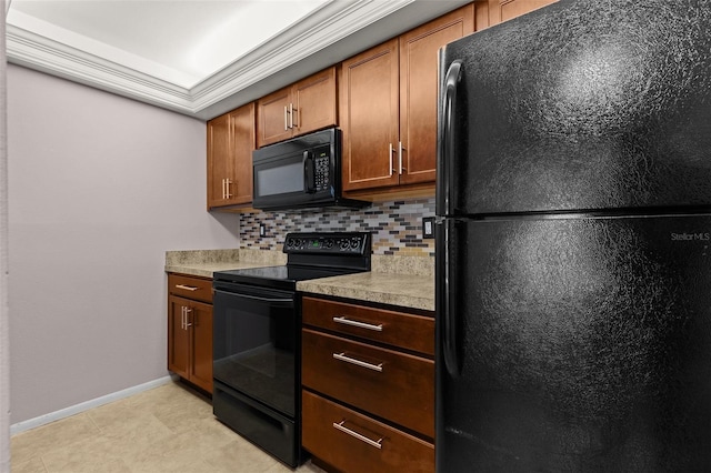 kitchen featuring backsplash, black appliances, light countertops, and ornamental molding