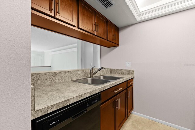 kitchen with visible vents, a sink, black dishwasher, a skylight, and light countertops