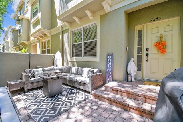 view of patio / terrace featuring a grill and outdoor lounge area