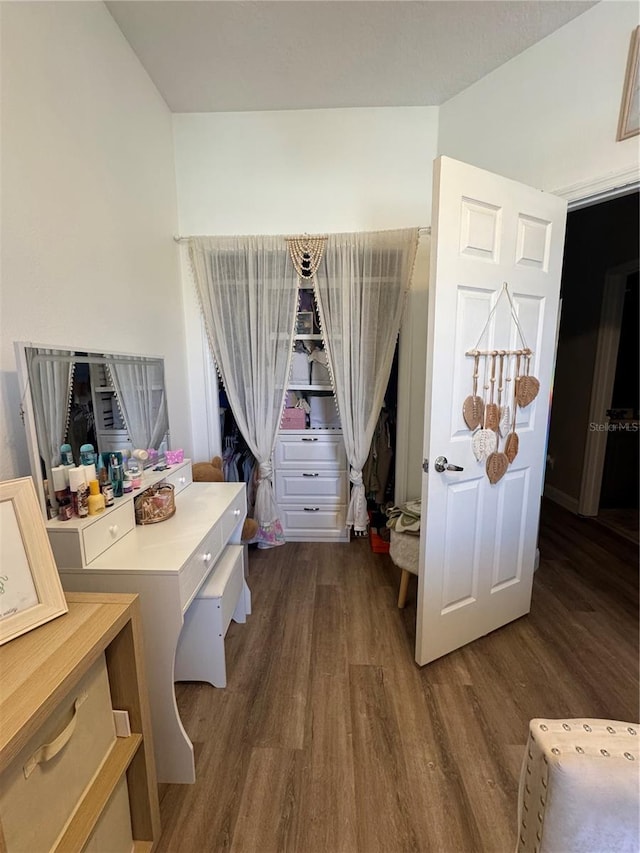 bedroom with wood finished floors