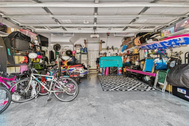 garage featuring a garage door opener