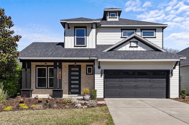 view of front facade featuring covered porch, board and batten siding, concrete driveway, a shingled roof, and a garage