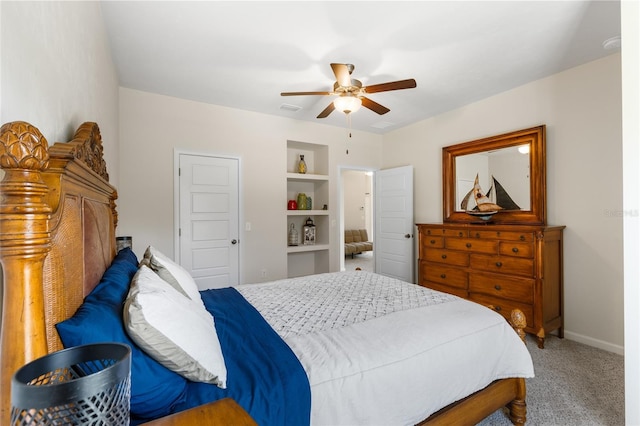 bedroom featuring visible vents, carpet floors, baseboards, and ceiling fan