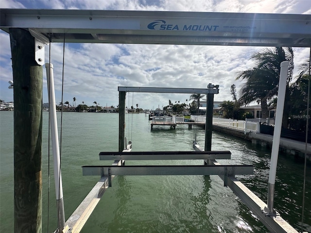 view of dock with a water view