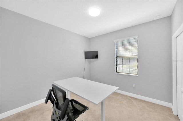 office area with baseboards and light colored carpet