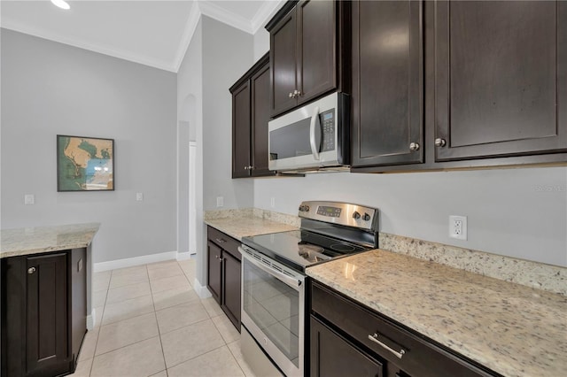 kitchen with ornamental molding, appliances with stainless steel finishes, light tile patterned flooring, baseboards, and light stone countertops