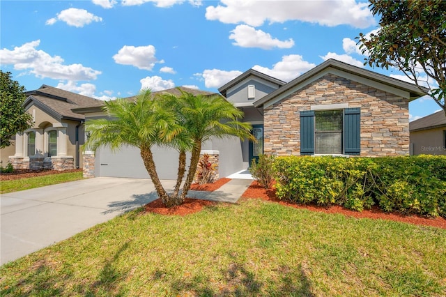 view of front of property featuring concrete driveway, a front yard, stucco siding, stone siding, and an attached garage