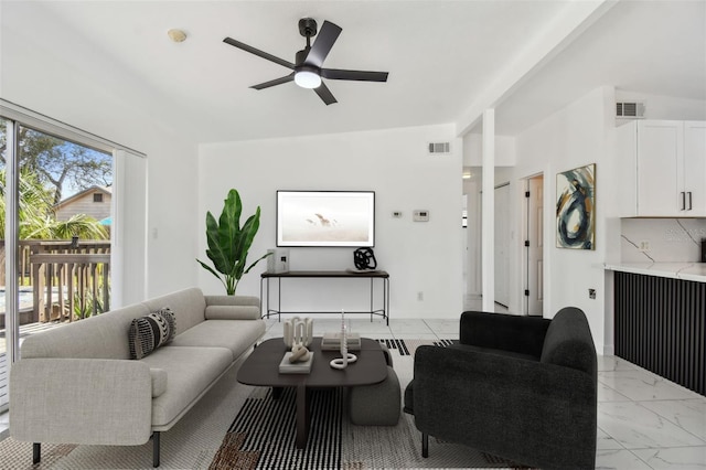 living room featuring a ceiling fan, visible vents, and marble finish floor