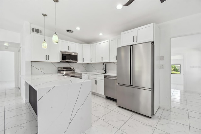 kitchen featuring a sink, marble finish floor, and stainless steel appliances