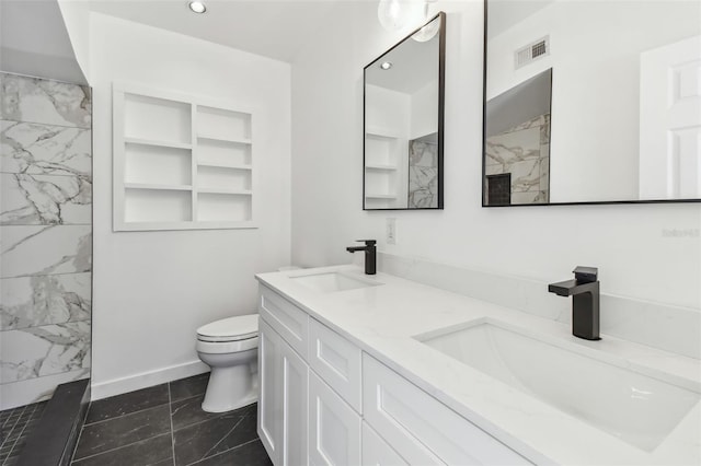 full bathroom with a marble finish shower, visible vents, toilet, and a sink