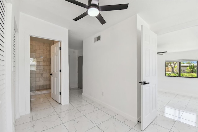 unfurnished bedroom with visible vents, baseboards, marble finish floor, and a ceiling fan