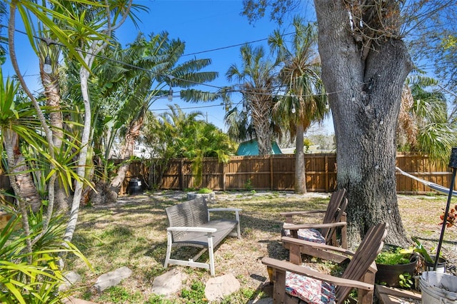 view of yard with a fenced backyard
