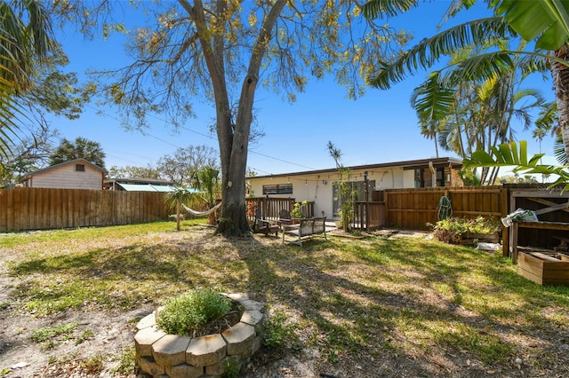 view of yard featuring a fenced backyard