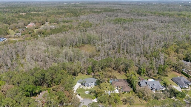 aerial view featuring a forest view