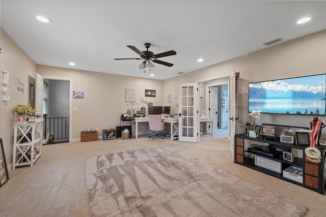 carpeted home office featuring recessed lighting, visible vents, a ceiling fan, and french doors