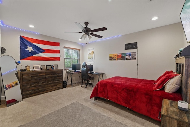 carpeted bedroom featuring recessed lighting and a ceiling fan