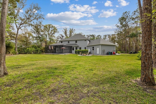 view of yard featuring a sunroom