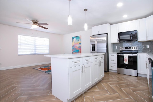 1902 Andover St Unit 198, Sun City Center, FL 33573 - kitchen featuring appliances with stainless steel finishes, ceiling fan, light countertops, baseboards, and white cabinets