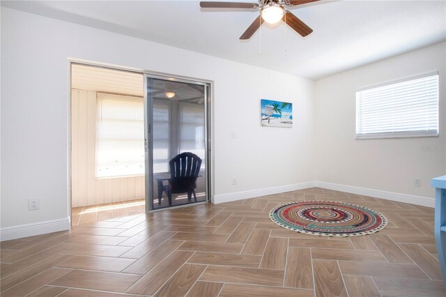 1902 Andover St Unit 198, Sun City Center, FL 33573 - unfurnished room with a ceiling fan, plenty of natural light, and baseboards