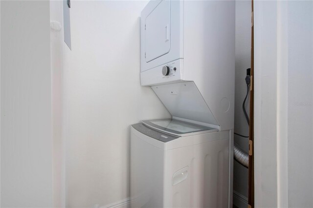 1902 Andover St Unit 198, Sun City Center, FL 33573 - laundry area featuring stacked washer and clothes dryer