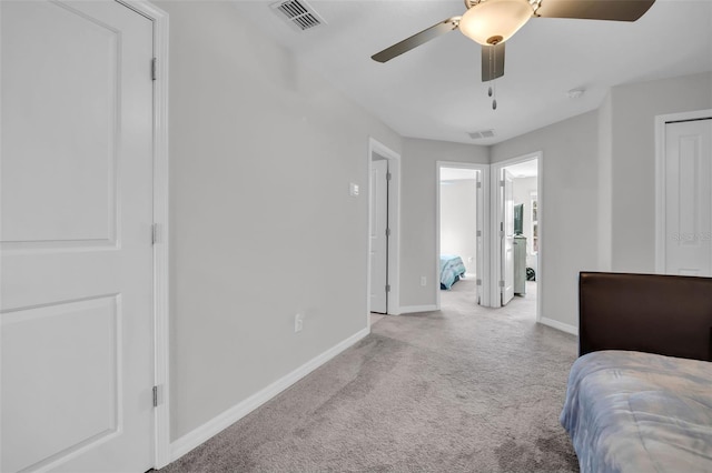 bedroom featuring baseboards, visible vents, carpet floors, and ceiling fan