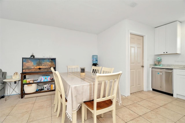 dining room with light tile patterned flooring