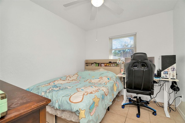 bedroom with baseboards, ceiling fan, and tile patterned flooring