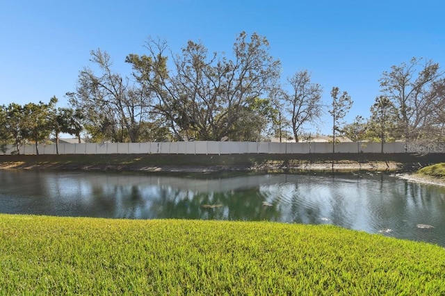 water view featuring fence