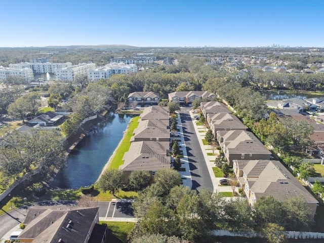 birds eye view of property featuring a residential view and a water view