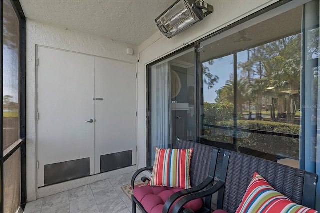 sunroom featuring visible vents