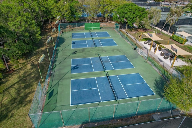 view of sport court with fence