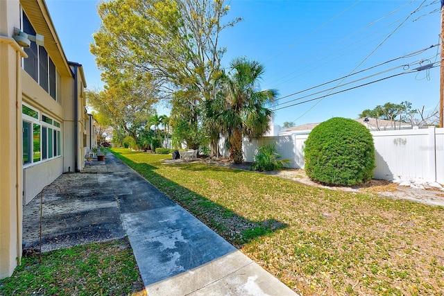 view of yard with fence