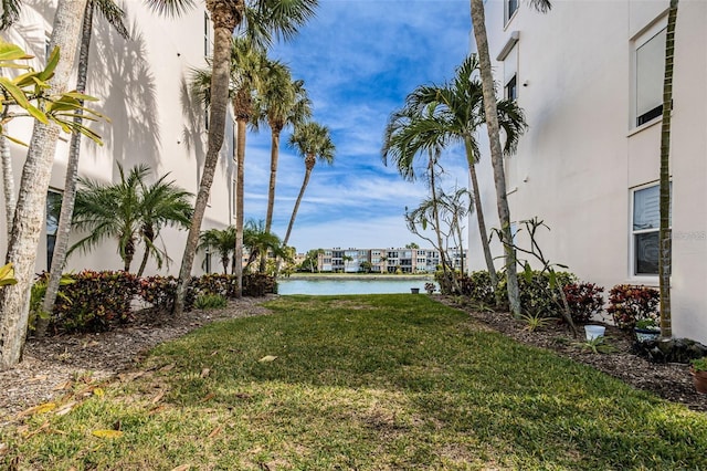 view of yard with a water view