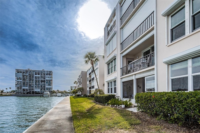 view of building exterior featuring a water view