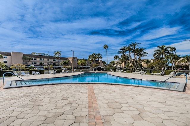 community pool featuring a patio