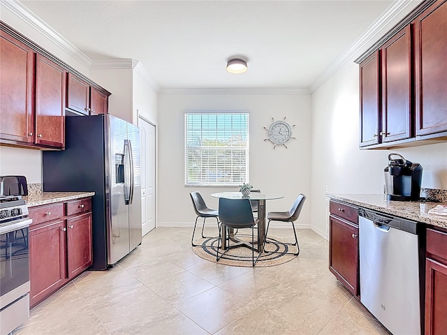 kitchen featuring dark brown cabinets, appliances with stainless steel finishes, and ornamental molding