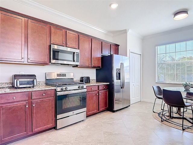 kitchen with light stone counters, appliances with stainless steel finishes, ornamental molding, and a toaster