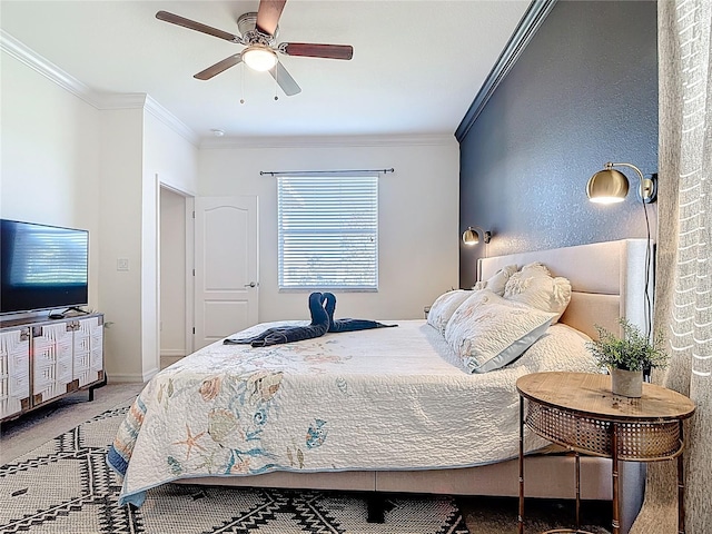 bedroom featuring light colored carpet, a ceiling fan, crown molding, and baseboards