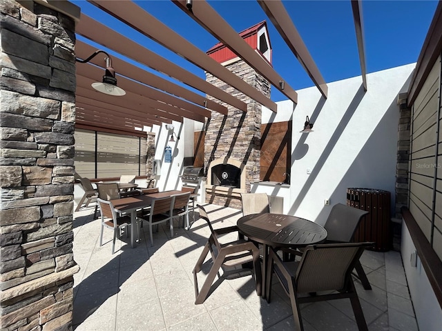 view of patio / terrace with grilling area, area for grilling, a pergola, and outdoor dining space