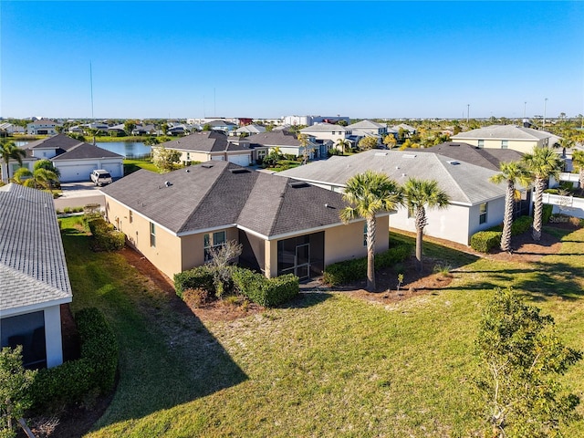 drone / aerial view with a residential view