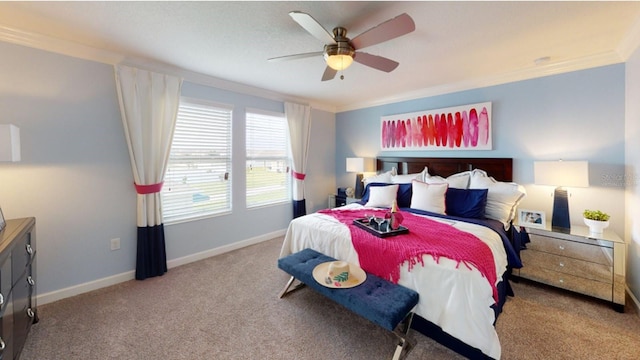 carpeted bedroom featuring a ceiling fan, crown molding, and baseboards