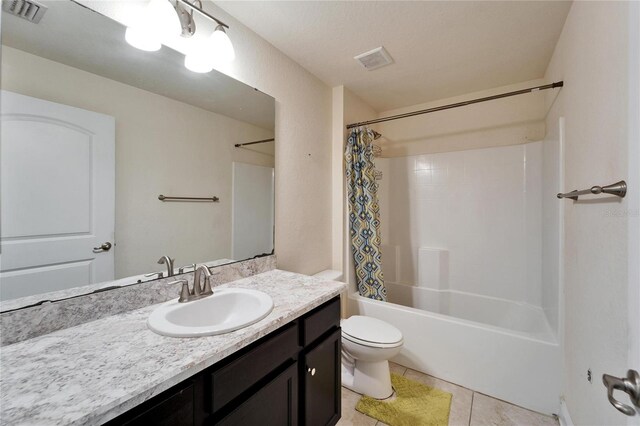 full bathroom featuring visible vents, toilet, vanity, and shower / bath combo