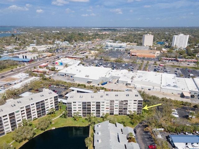 drone / aerial view with a view of city and a water view