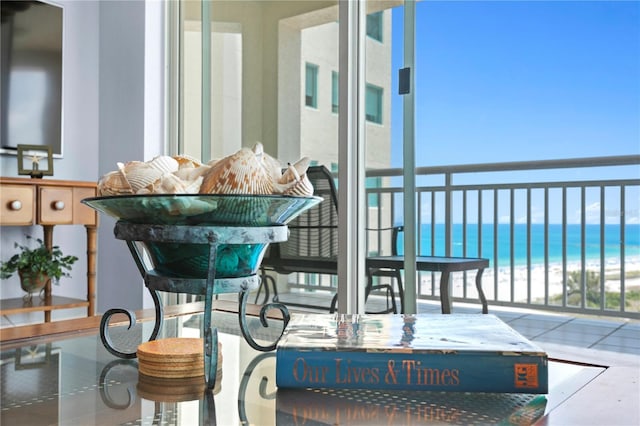 balcony featuring a water view