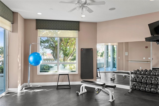 workout area with recessed lighting, a healthy amount of sunlight, baseboards, and ceiling fan