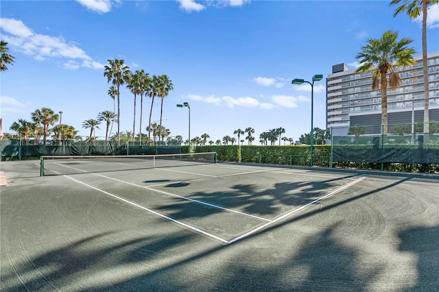 view of sport court with community basketball court and fence